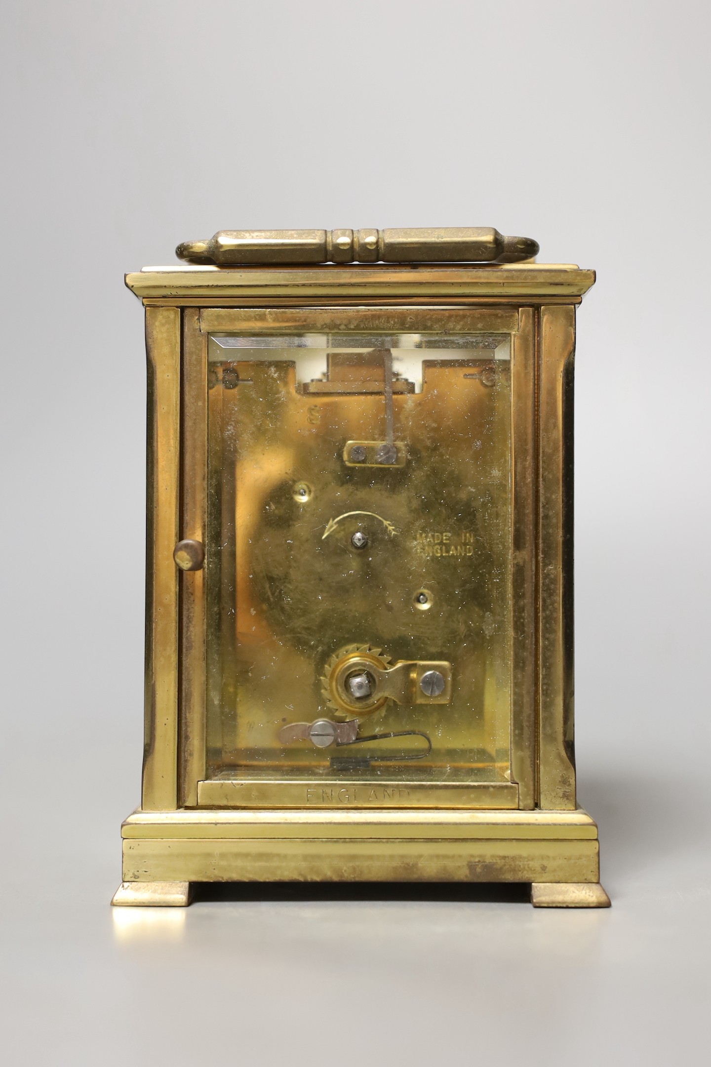 A Dent retailed brass carriage timepiece, 12 cms high.